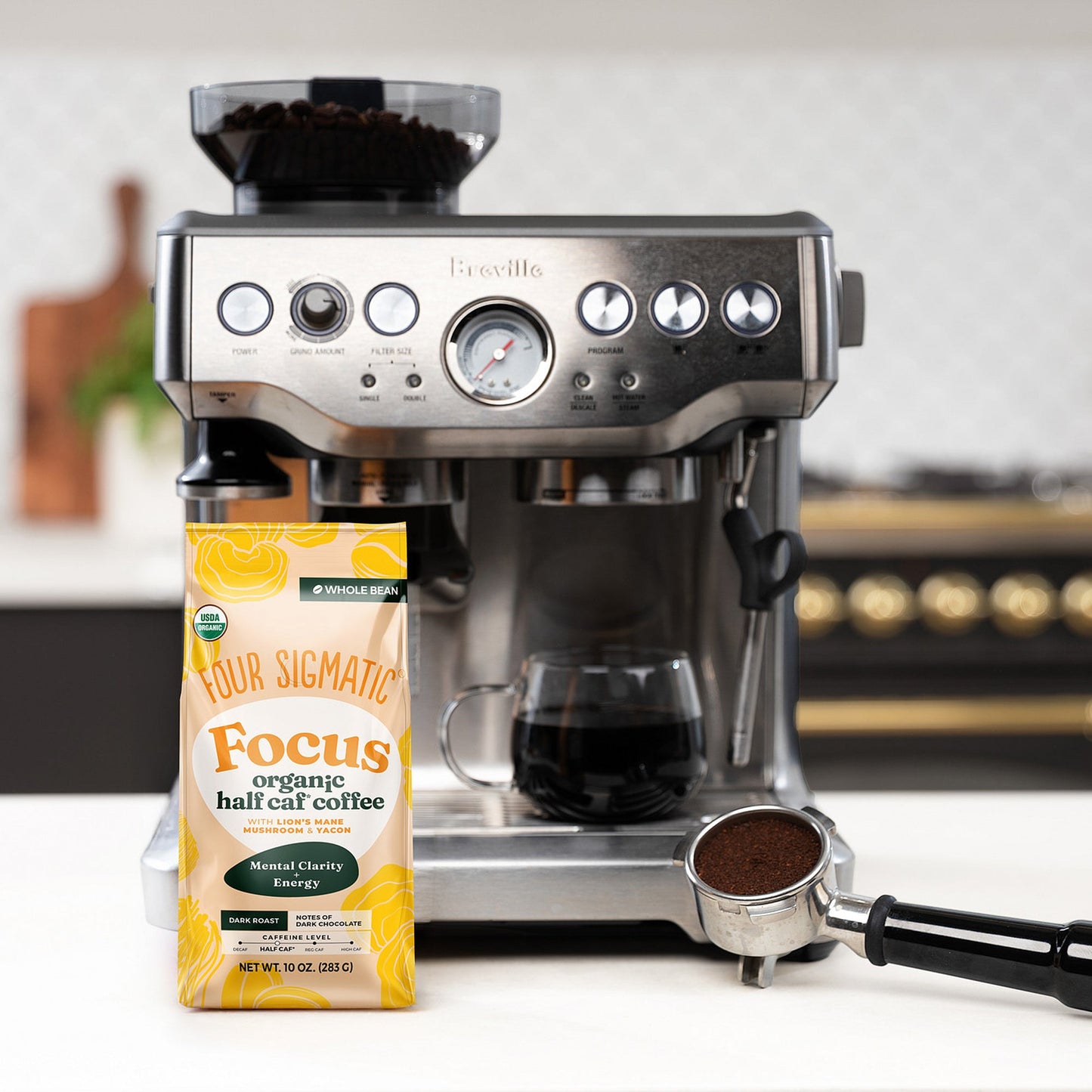focus-half-caf-whole-bean-coffee-f9 Focus_Org_Dark_Roast_High_Caf_Kitchen_Pour_Woman_4_47b71a0c-c7fc-40fd-a2bc-fa7389dfb410.jpg